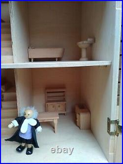Wooden Dolls House Complete With Dolls And Furniture