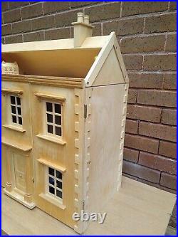 Wooden Dolls House Complete With Dolls And Furniture