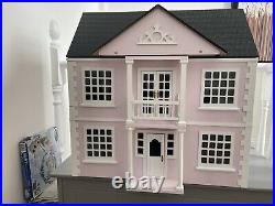 Wooden Dolls House. Furniture Included