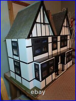 Wooden Dolls House With Furniture