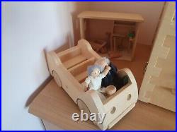 Wooden Dolls house, fully furnished with car & garden shed. Possibly ELC. VGC