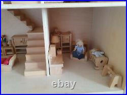 Wooden Dolls house, fully furnished with car & garden shed. Possibly ELC. VGC