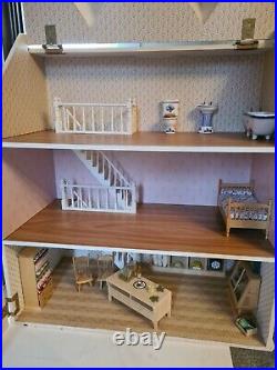 Wooden Dolls house grocery store with furniture