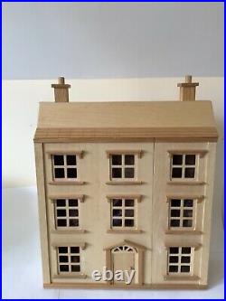 Wooden Dolls house with lots of contents