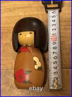 Wooden Kokeshi Doll Sign