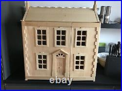 Wooden dolls house Plan toys Brand