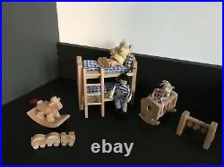 Wooden dolls house Plan toys Brand