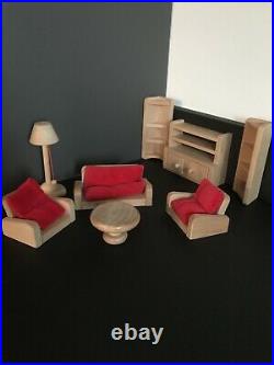 Wooden dolls house Plan toys Brand