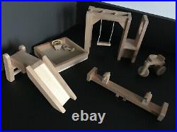 Wooden dolls house Plan toys Brand