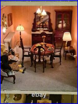 Wooden dolls house and furniture
