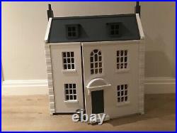 Wooden dolls house hand painted with farrow and ball With wooden doll family