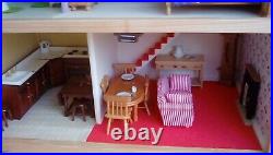Wooden dolls house in cream and blue 5 or 6 rooms in very good condition