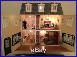Wooden dolls house, large 3 storey, lights, furniture, figures and accessories