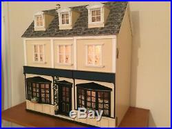 Wooden dolls house, large 3 storey, lights, furniture, figures and accessories